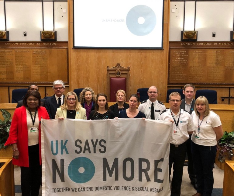 Cabinet Member for Children’s Services Cllr Kelly Braund and Cabinet Member for Community Safety, Engagement and Equalities Cllr Edith Macauley with partners and officers supporting the international campaign against domestic violence and sexual assault.